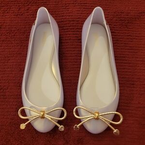 Melissa Pearl White Flats with Gold Bow